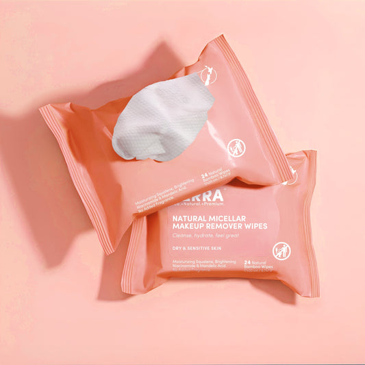 Two packs of Natural Micellar Makeup Remover Wipes on a pink background